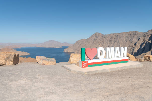 The I love Oman Sign over looking Khor Najd - Khawr Najd lagoon, Musandam, Oman