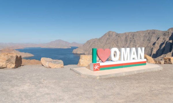 The I love Oman Sign over looking Khor Najd - Khawr Najd lagoon, Musandam, Oman